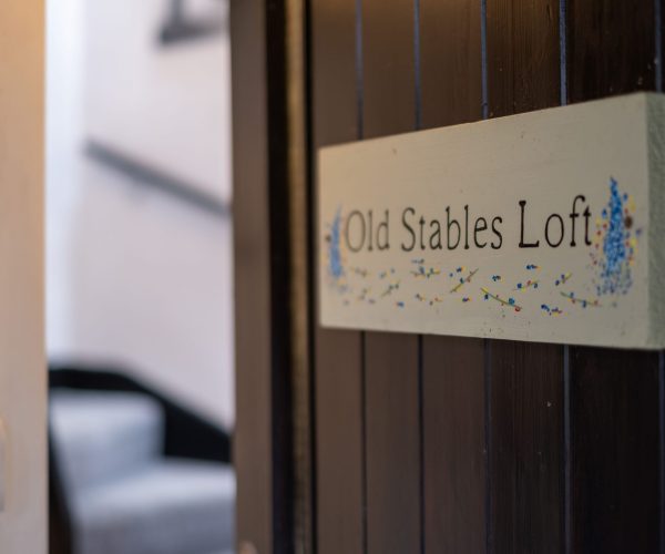 Old-Stables-Loft-Kendal-Holiday-Apartment-Front-Door-Signage