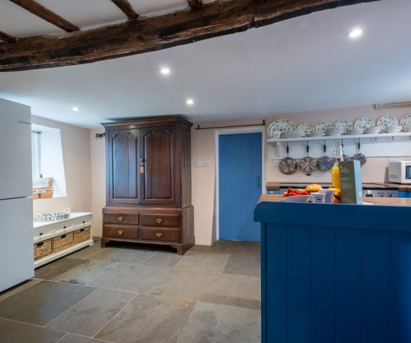 Rustic beams and modern comfort Low Longmire Cottage kitchen