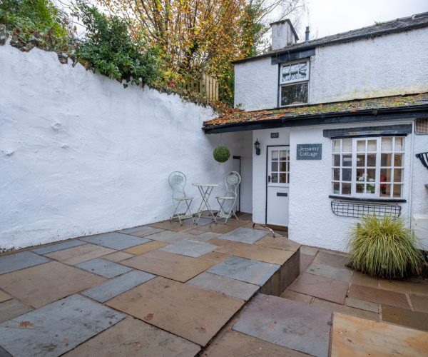 Cottage frontage and parking space, just minutes from the lake and village centre.