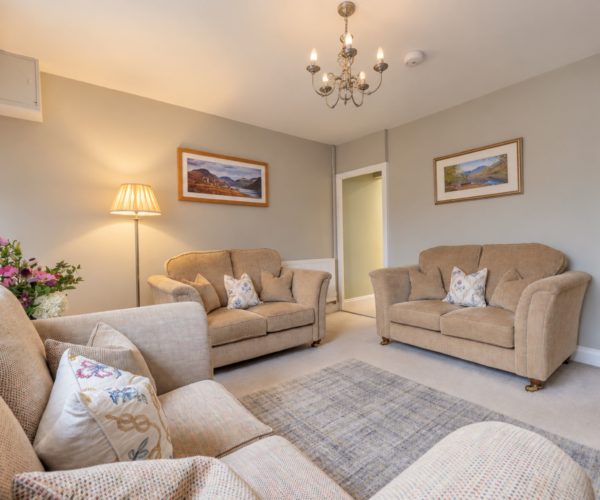 Charming lounge with cosy furnishings in our Windermere holiday accommodation
